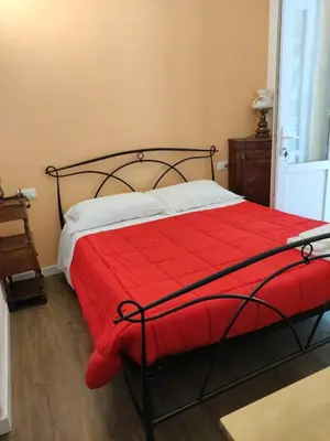 Letto o letti in una camera di Loggia Piani Nuovi