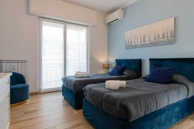 Letto o letti in una camera di Casa Emy