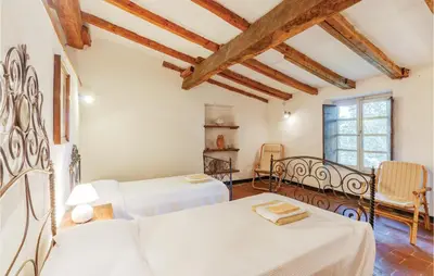 Letto o letti in una camera di Casa Lasetto