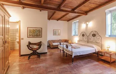 Letto o letti in una camera di Casa Lasetto
