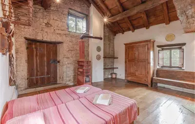 Letto o letti in una camera di Casa Il Fienile