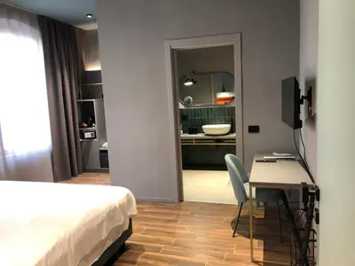 Letto o letti in una camera di Materiaprima camere-rooms