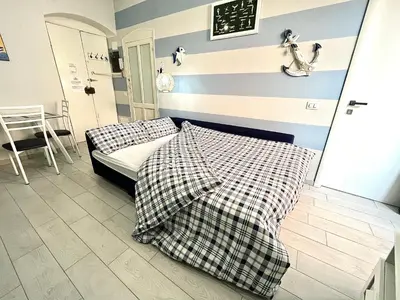 Letto o letti in una camera di Cà del Mar - La Spezia e Cinque Terre