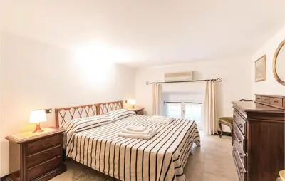 Letto o letti in una camera di Belvedere