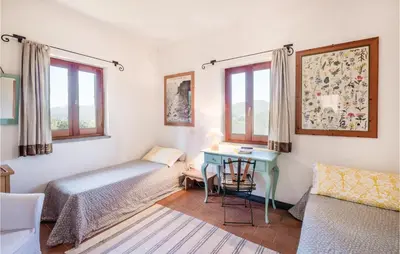 Letto o letti in una camera di Casa Il Gumo