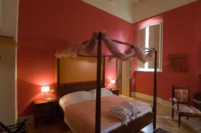Letto o letti in una camera di Le Notti in Villa