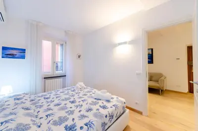 Letto o letti in una camera di Appartamento di design
