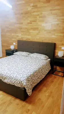 Letto o letti in una camera di Casa Caterina