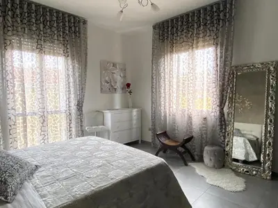 Letto o letti in una camera di La casa di Betty