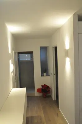Letto o letti in una camera di Modena Charme Belle Arti