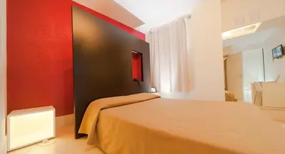 Letto o letti in una camera di Savoy Hotel