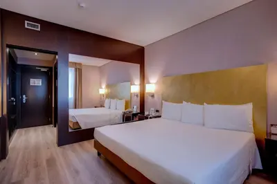 Letto o letti in una camera di Hotel Nord