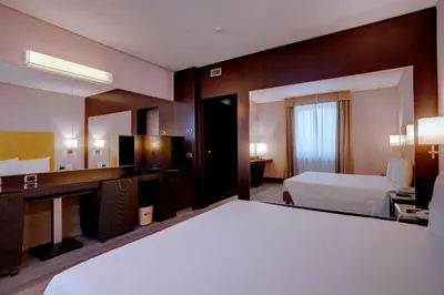 Letto o letti in una camera di Hotel Nord