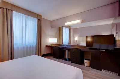 Letto o letti in una camera di Hotel Nord