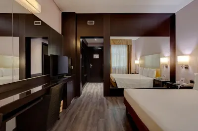 Letto o letti in una camera di Hotel Nord