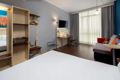 TV o dispositivi per l'intrattenimento presso Holiday Inn Express Parma by IHG
