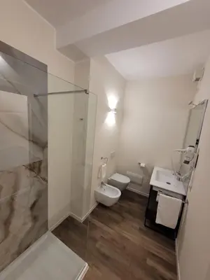 Bagno di STOP&GO Suites and Apartments