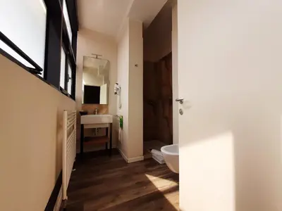 Letto o letti in una camera di STOP&GO Suites and Apartments
