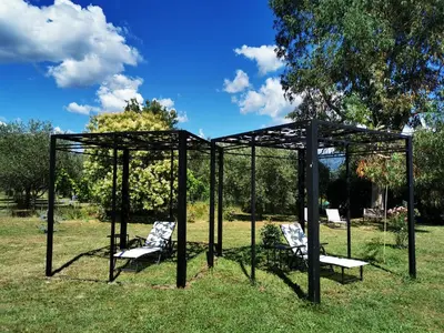 Giardino di ArtVillaArmonia Sarzana, villa piscina esclusiva