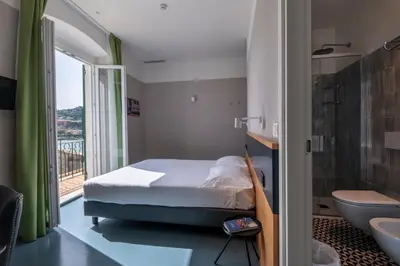 Letto o letti in una camera di Hotel Italia e Lido