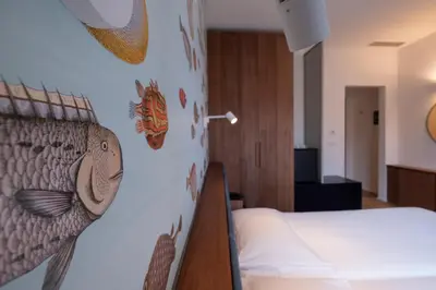 Letto o letti in una camera di Hotel Italia e Lido