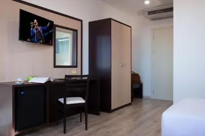 Letto o letti in una camera di CDH Hotel Modena