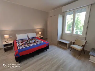 Letto o letti in una camera di ALBA RESIDENCE