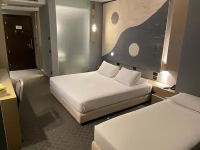 Letto o letti in una camera di Bes Hotel Cremona Soncino