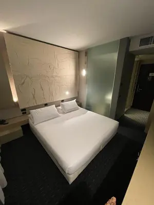 Letto o letti in una camera di Bes Hotel Cremona Soncino