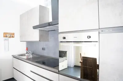 Cucina o angolo cottura di 021 - Casa Ponente con Terrazzo - CENTRO città, Carruggio e Mare BAIA DEL SILENZIO a 500 m
