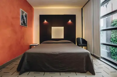 Letto o letti in una camera di DelleArti Design Hotel