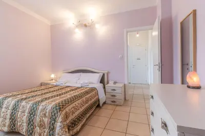 Letto o letti in una camera di Da Birba a Casinalbo Affitti Brevi Italia