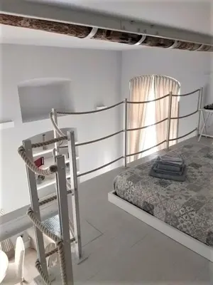 Letto o letti in una camera di La Casa di Tommy