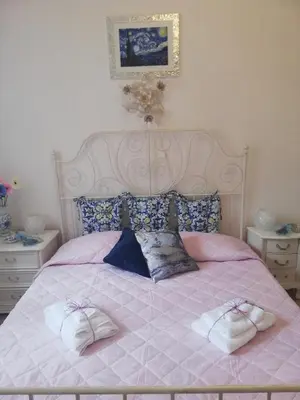 Letto o letti in una camera di Villa Chanel