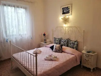 Letto o letti in una camera di Villa Chanel