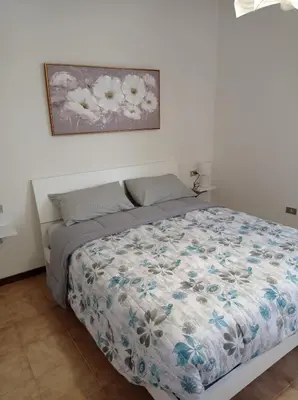 Letto o letti in una camera di HOUSE PIAZZA VITTORIA