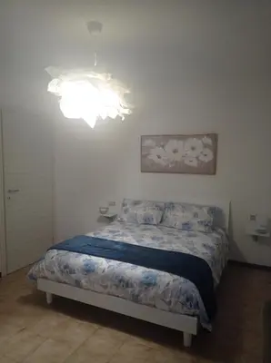 Letto o letti in una camera di HOUSE PIAZZA VITTORIA
