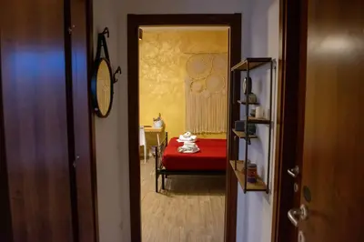 Letto o letti in una camera di Emmanueli65 fronte clinica per 4 matrimoniale e castello