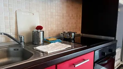 Cucina o angolo cottura di FGH Apartment ZONA FIERA FREE PARKING