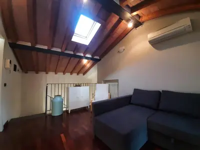 Area soggiorno di Appartamento sui tetti di Parma