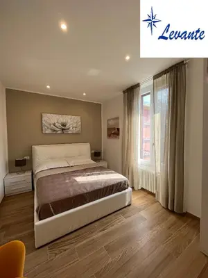 Letto o letti in una camera di LEVANTE Central Rooms