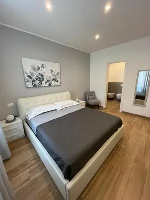 Letto o letti in una camera di LEVANTE Central Rooms