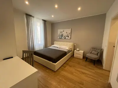 Letto o letti in una camera di LEVANTE Central Rooms