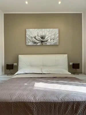 Letto o letti in una camera di LEVANTE Central Rooms