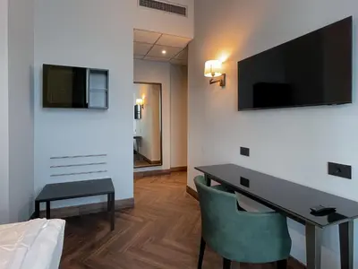 TV o dispositivi per l'intrattenimento presso Hotel Impero