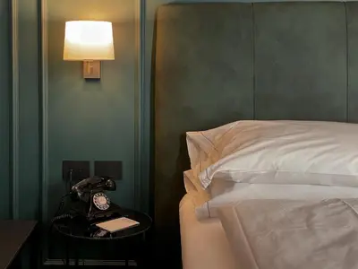 Letto o letti in una camera di Hotel Impero
