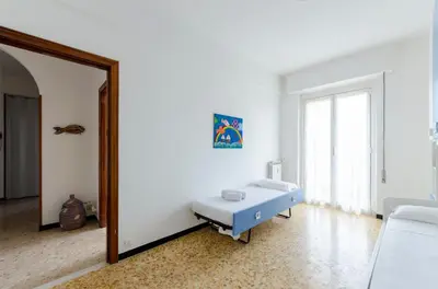 Letto o letti in una camera di JOIVY Family Flat Terrace & Parking near Beach