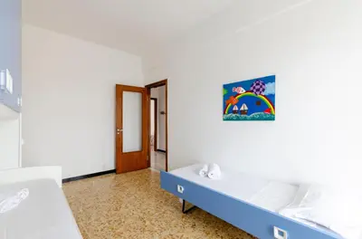 Letto o letti in una camera di JOIVY Family Flat Terrace & Parking near Beach