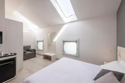Letto o letti in una camera di Hotel Vecchio Casello
