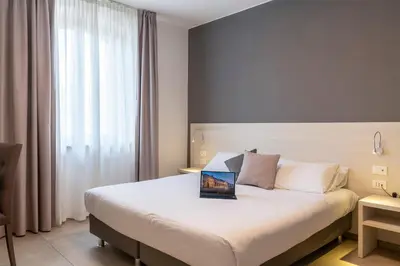 Letto o letti in una camera di Hotel Vecchio Casello